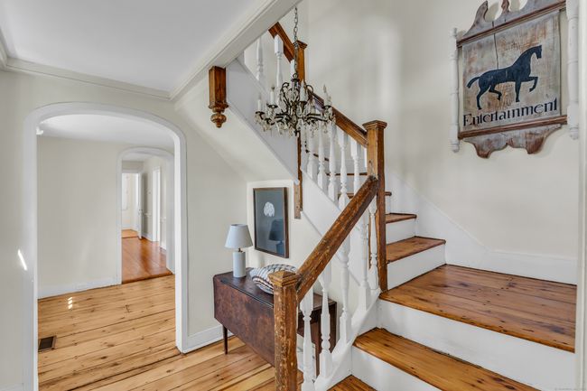 The Front Stair Case Leading To The Upper Level | Image 22