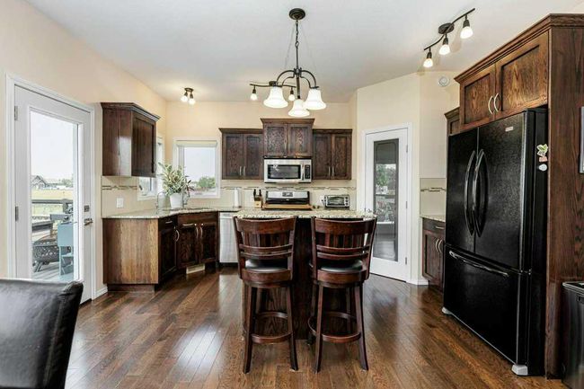 6305 58 Avenue, House other with 4 bedrooms, 3 bathrooms and 2 parking in Innisfail AB | Image 8