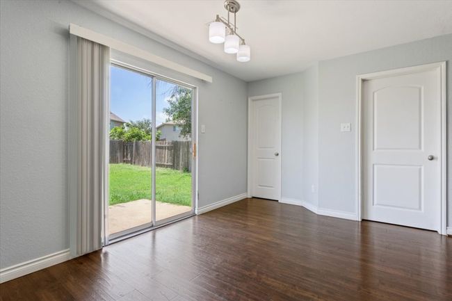 Half Bath and laundry room/pantry off the dining/kitchen area | Image 11