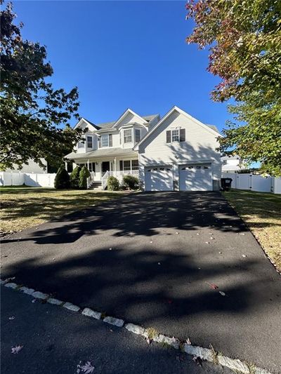 View of front of home with covered porch | Image 1