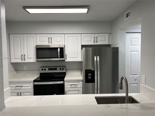apt-102-2871 N Oakland Forest Dr, Oakland Park, FL, 33309-6406 | Card Image