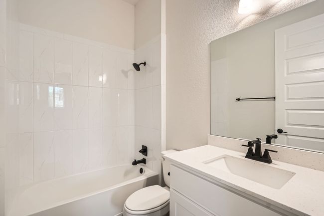 Full bath with toilet, shower / bathtub combination, and vanity | Image 21