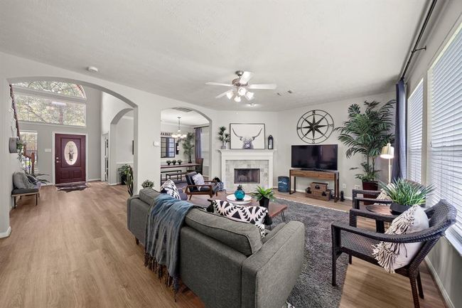 Another view of family room leading to front entryway. | Image 8