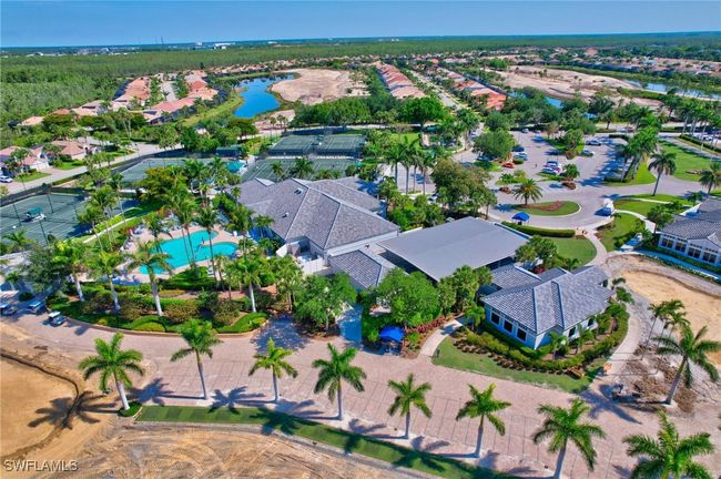 Aerial view showing the golf course that is in renovation and the lushness of the community | Image 47