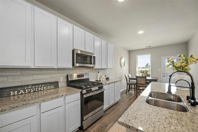 32703 Dew Crest St, House other with 5 bedrooms, 3 bathrooms and 2 parking in Fulshear TX | Image 6