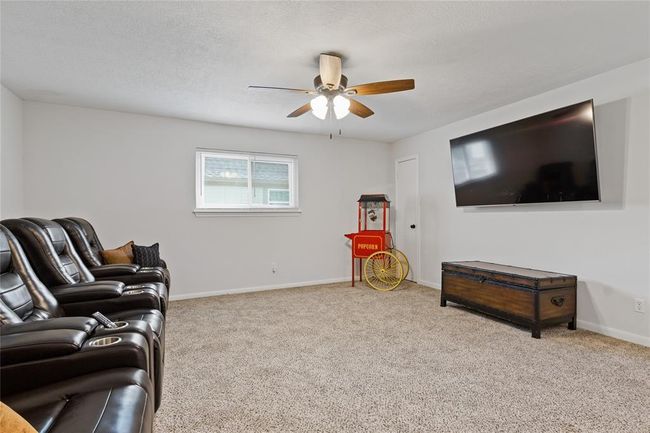 Spacious game room upstairs. | Image 34