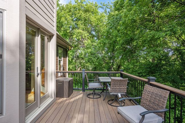 The private, maintenance-free, deck is ideal for warm-weather dining and relaxation. | Image 9