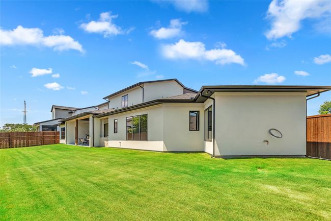 Rear view of house featuring stucco siding | Image 39