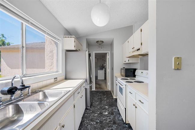 7309 Berwick Way, House other with 3 bedrooms, 2 bathrooms and null parking in Weeki Wachee FL | Image 13