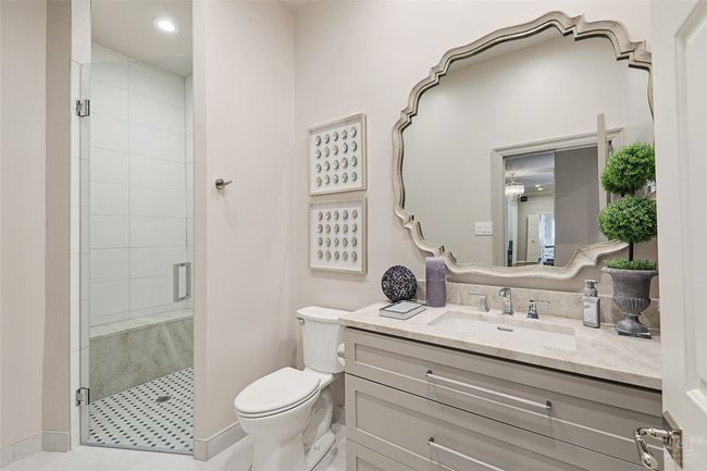 Full bath featuring a shower stall, vanity, and recessed lighting | Image 18