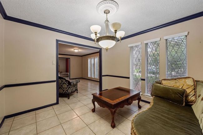Designed to be the formal dining room, you can also make this room into an office. | Image 6