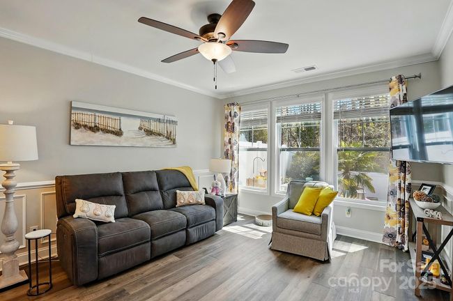 Morning sun adds lots of natural light to the kitchen and great room area. | Image 8