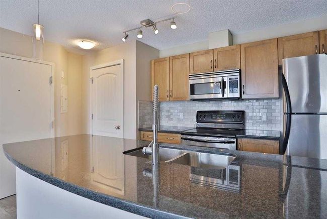4 - 101 Village Heights Sw, Home with 2 bedrooms, 2 bathrooms and 1 parking in Calgary AB | Image 5
