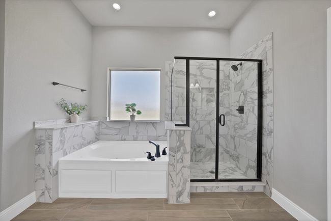 Full bath featuring a bath, a marble finish shower, baseboards, and recessed lighting | Image 24