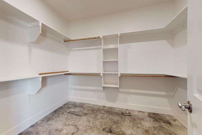View of walk in closet | Image 11