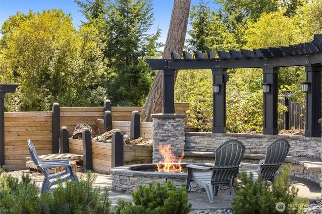 Stunning firepit and sitting area in backyard. | Image 35