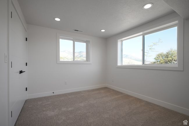 Unfurnished room featuring carpet flooring, recessed lighting, and baseboards | Image 30