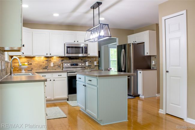 Kitchen - Updated lighting, New Appliances, Refinished Wood Floor | Image 7