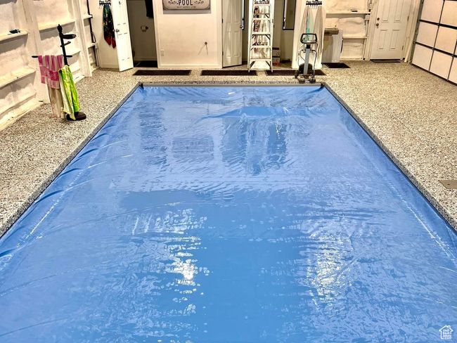View of pool featuring a covered pool | Image 73