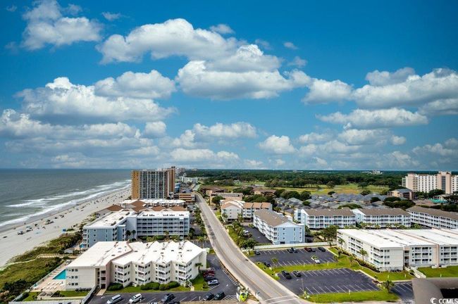 Birds eye view of property featuring a view of the beach and a water view | Image 38
