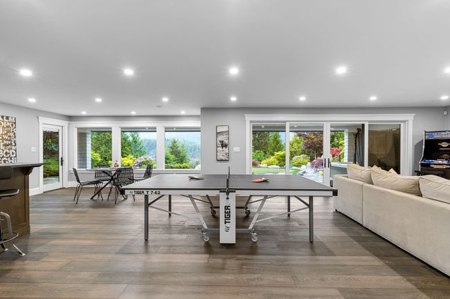 Game room featuring wood finished floors and recessed lighting | Image 26