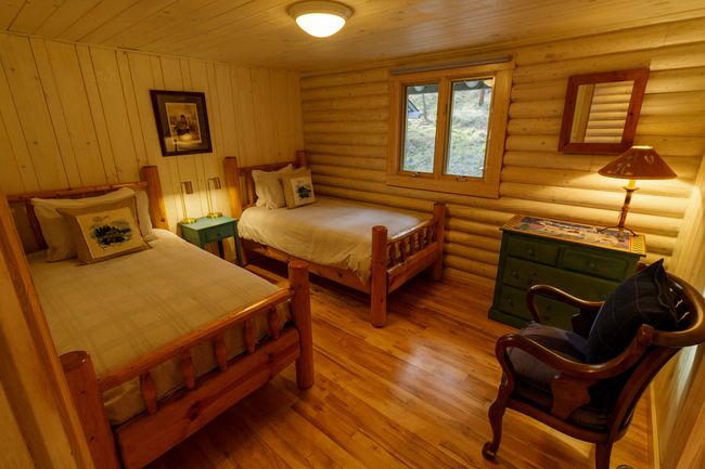 Bedroom featuring light wood-type flooring and wooden ceiling | Image 28