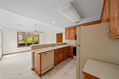 Kitchen looking into hearth room | Image 3