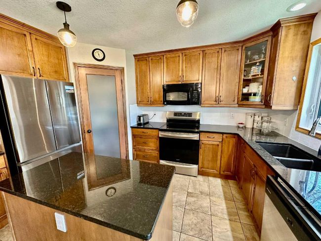 249 Fairway Drive, Home with 4 bedrooms, 3 bathrooms and 5 parking in Coaldale AB | Image 12
