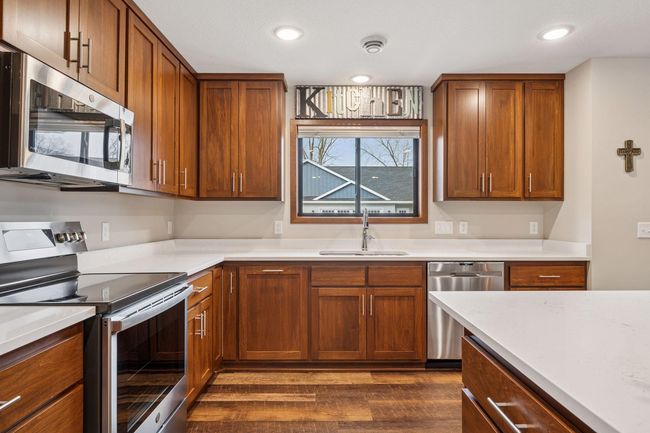Quartz countertops and matching stainless steel appliances | Image 6