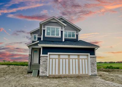 136 Threepoint Cove, House detached with 3 bedrooms, 2 bathrooms and 4 parking in Okotoks AB | Image 1