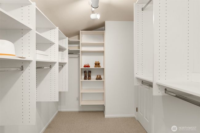 Enjoy the beauty of thoughtful organization with custom built-ins and generous storage space throughout the home. | Image 19