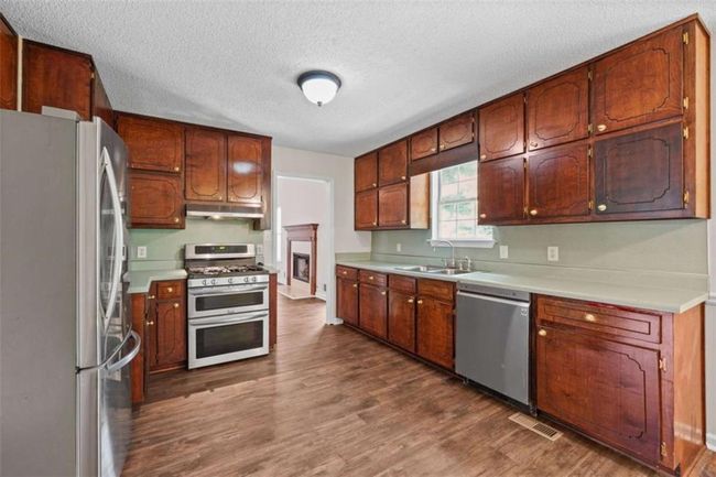 128 Kelleytown Woods Dr, House other with 4 bedrooms, 2 bathrooms and 4 parking in Mcdonough GA | Image 9
