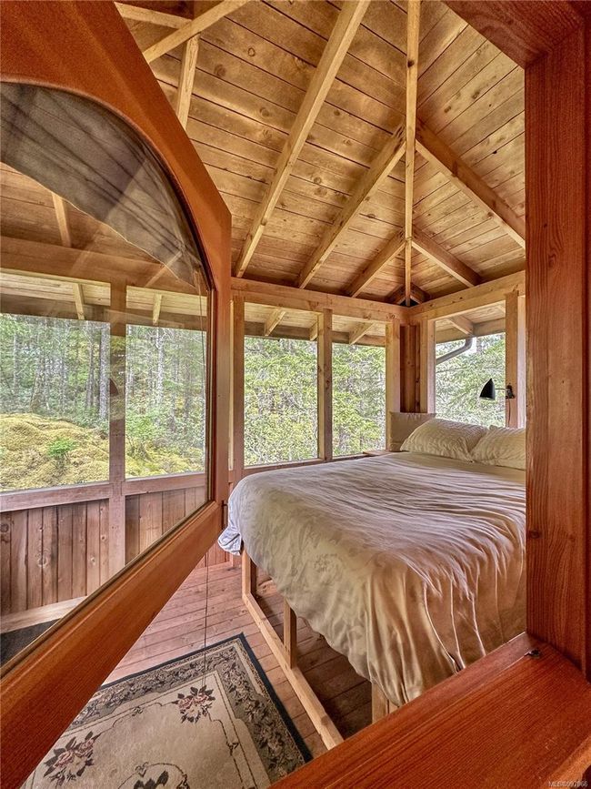 Split door allows a beautiful breeze off the family room and into the outdoor sleeping loft | Image 57