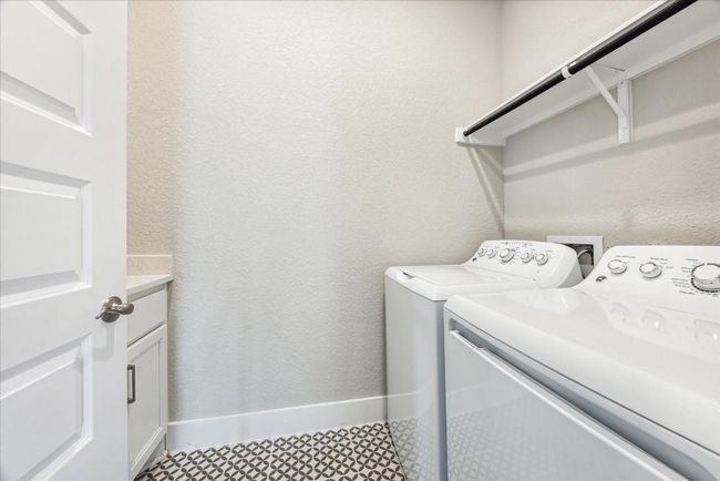 This fun accent tile makes the utility room a cheery space...you may even enjoy doing laundry in it! | Image 35