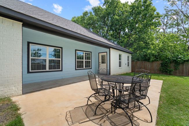 View of patio featuring outdoor dining space | Image 34
