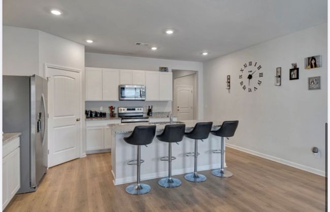 Large open kitchen with walk in pantry. | Image 7