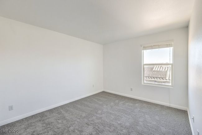 Empty room featuring carpet and baseboards | Image 17