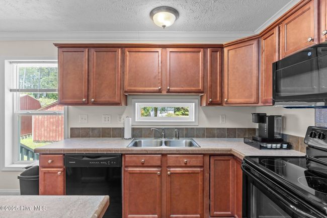 233 Ne 70 Th St, House other with 3 bedrooms, 2 bathrooms and null parking in Oak Island NC | Image 10
