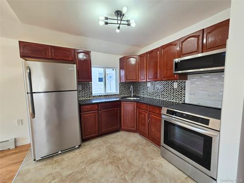 219 114th Rd, Cambria Heights, NY, 11411-1100 | Card Image