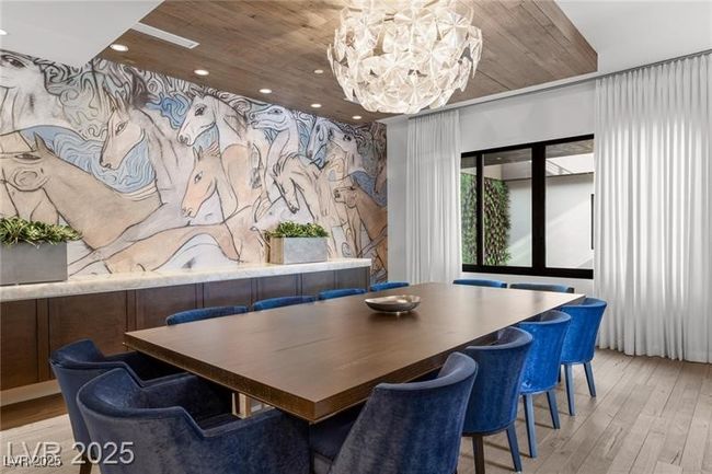 Dining room featuring wooden ceiling, wood finished floors, an inviting chandelier, and recessed lighting | Image 23