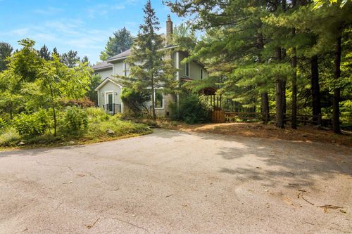 7651 E Timberwoods Dr, Traverse City, MI, 49684-7523 | Card Image