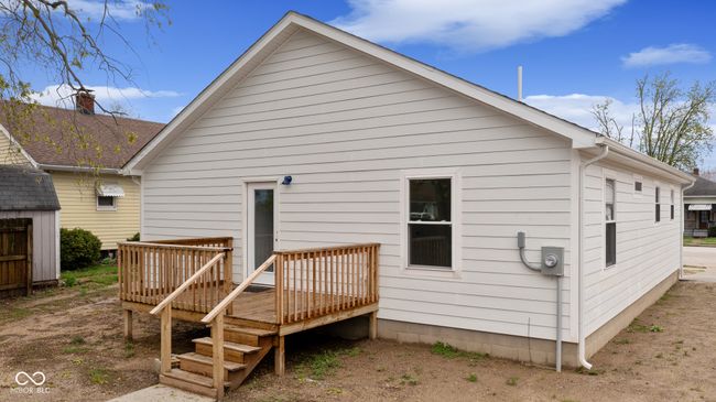 back of house featuring a deck | Image 9