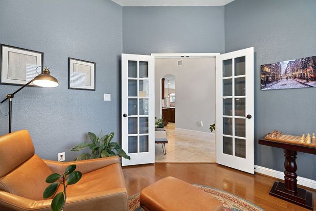 French doors allow for a quiet workspace away from the rest of the home. | Image 7