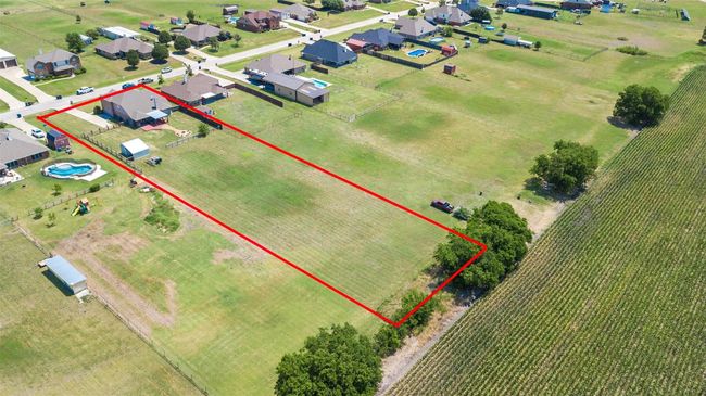 Birds eye view of property & the corn fields. This was taken before the above ground pool was installed. | Image 31