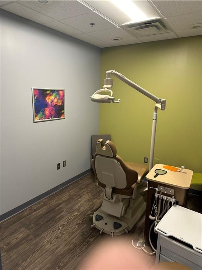 Miscellaneous room with a paneled ceiling and dark wood-type flooring | Image 25