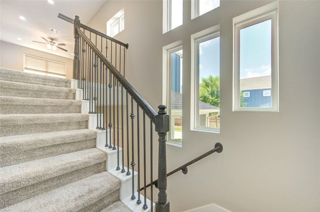 Staircase with tons of natural light. | Image 15