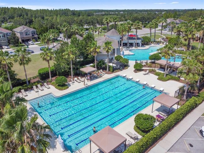 7705 Momentum Parkway Parkway, Townhouse with 3 bedrooms, 2 bathrooms and null parking in Wesley Chapel FL | Image 4