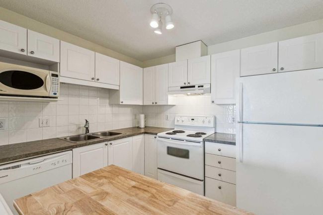 1314 - 928 Arbour Lake Rd Nw, Condo with 2 bedrooms, 2 bathrooms and 1 parking in Calgary AB | Image 6