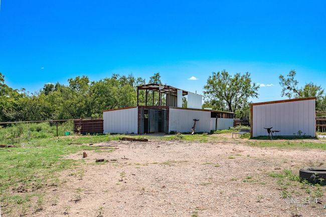View of yard featuring an outdoor structure | Image 29