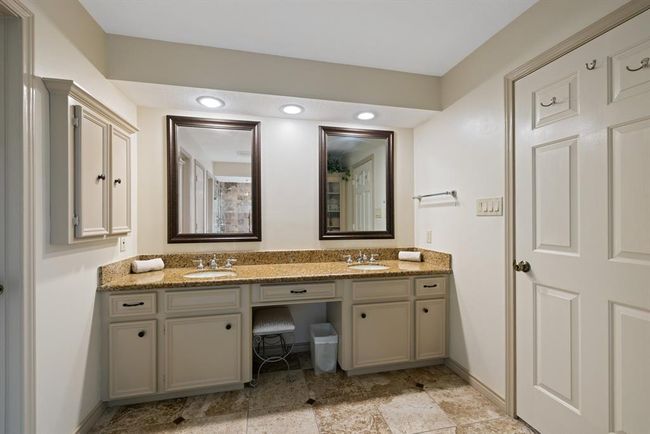 Primary bath also features a built-in vanity and built-in wall (medicine) cabinet | Image 29